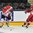GRAND FORKS, NORTH DAKOTA - APRIL 15: Canada's Dante Fabro #4 makes a pass while Denmark's David Madsen #14 defends during preliminary round action at the 2016 IIHF Ice Hockey U18 World Championship. (Photo by Minas Panagiotakis/HHOF-IIHF Images)

